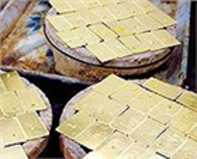 Giá vàng giảm nhẹ và có dấu hiệu tăng tiếp