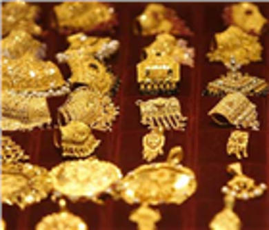 Vàng, dầu chốt lại tuần mất giá mạnh