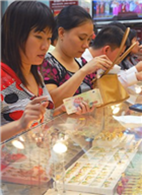 Giá vàng lùi về mốc 16,5 triệu đồng