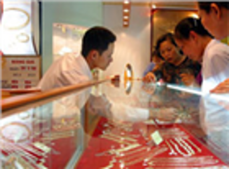 Vàng mất mốc 1,8 triệu